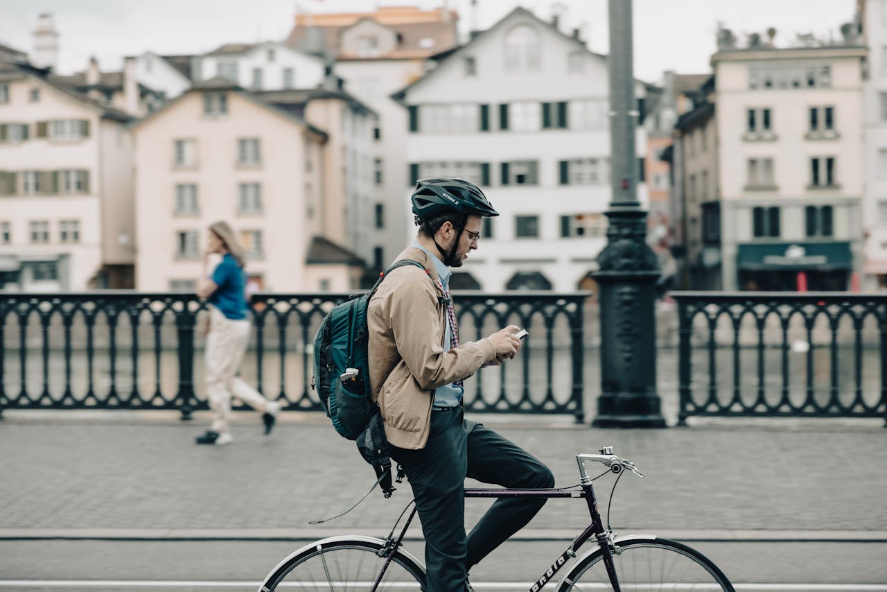 Cyclist using RideAheadWeather.com app to check weather before a fun ride